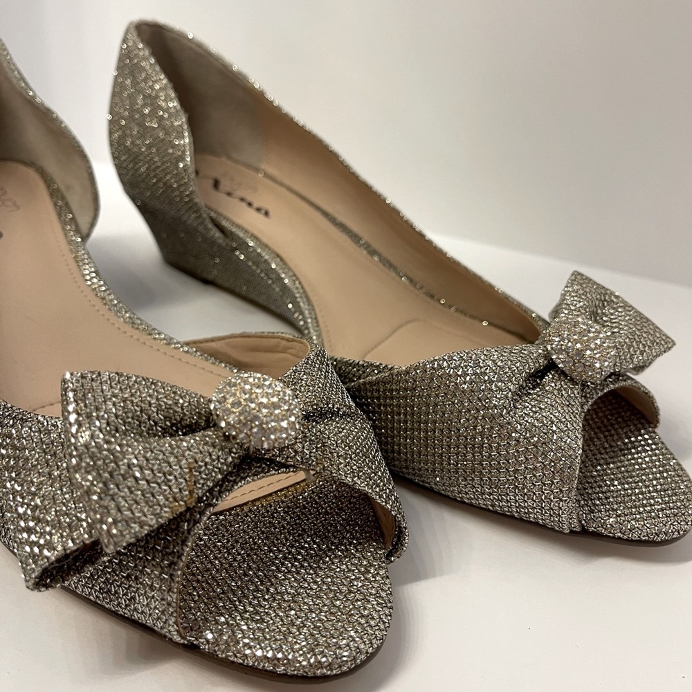 NINA silver glitter peep toe bow front wedges